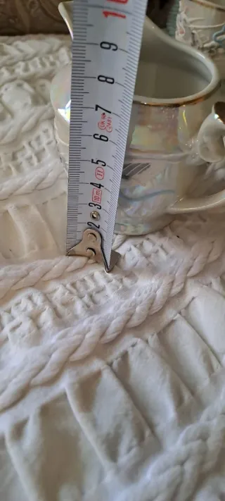 Juego de taza y jarra de porcelana