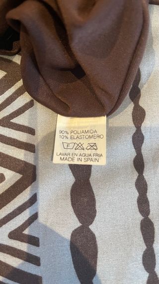 Blusa manga larga con plumas