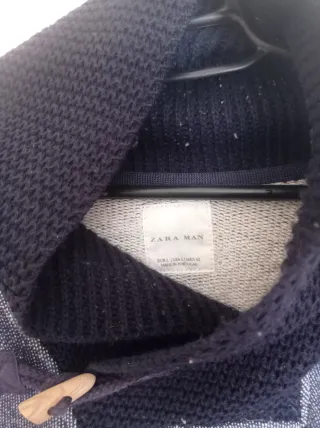 Jersey azul y gris con cuello