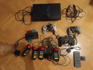 Consola y accesorios PlayStation 2 + Videojuegos