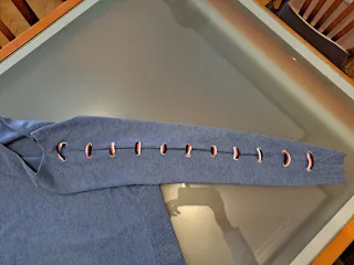 Jersey fino cuello redondo adornos mangas