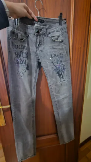 Pantalones jeans vaqueros grises con diseño