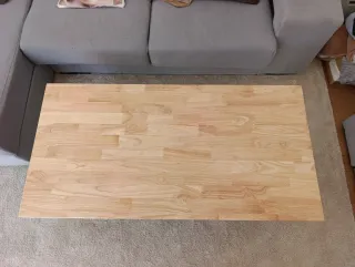 Mesa de centro elevable madera y metal.