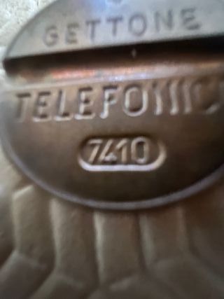 Gettoni telefonici vintage in bronzo
