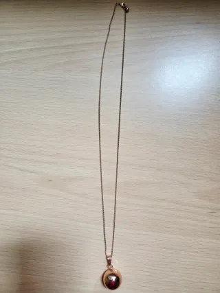 Colgante cascabel dorado