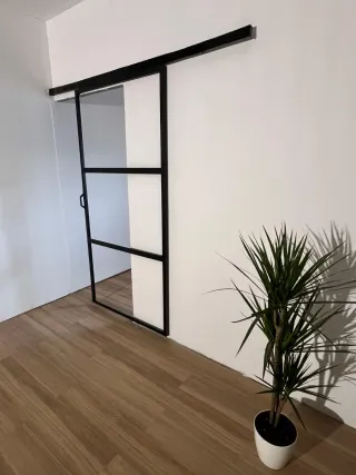 Puerta corredera cristalera