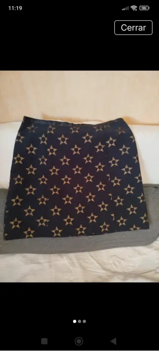 Falda corta estrellas negra y dorada