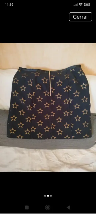 Falda corta estrellas negra y dorada