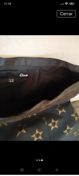 Falda corta estrellas negra y dorada