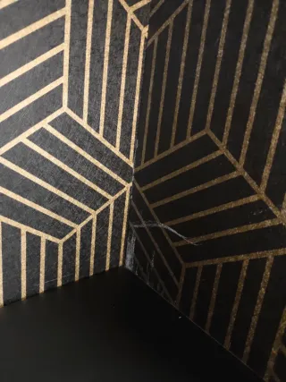 Librería IKEA Brimmes Negra con Detalles Dorados