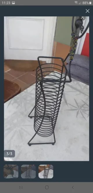 Porta CDs con figura decorativa