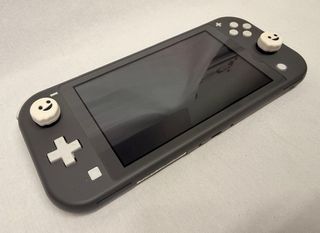 Console portatile Nintendo Switch Lite + custodia