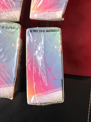 Pokemon Prismatic Booster dañados