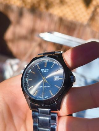 Reloj Casio Negro y Dorado Quartz Elegante