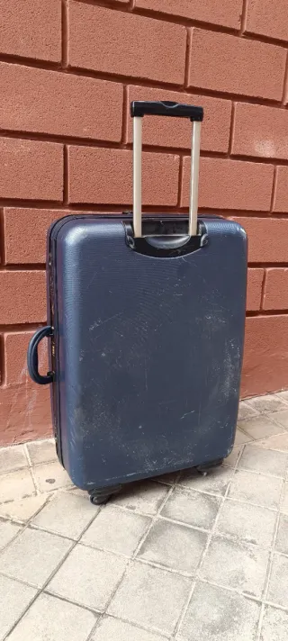 Maleta XXL 4 ruedas azul rigida marca Dustin