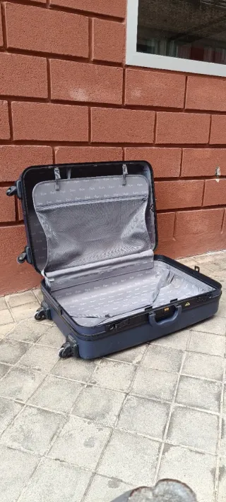 Maleta XXL 4 ruedas azul rigida marca Dustin