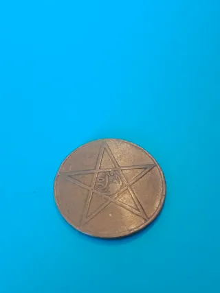 Moneda antigua arabe