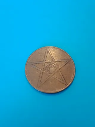 Moneda antigua arabe