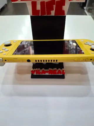 Nintendo Switch Lite Amarilla + Cargador