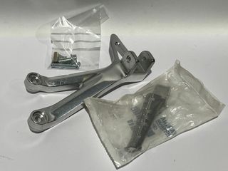 Conjunto nuevo estribera trasera izq. TZR50