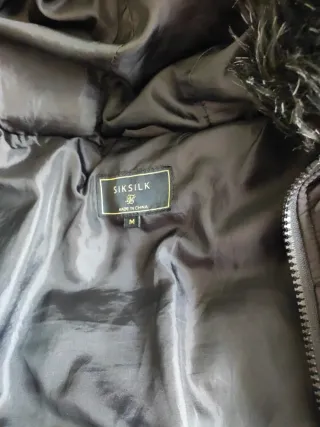 Cazadora acolchada chico con capucha