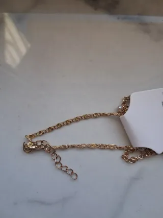 Pulsera dorada eslabones