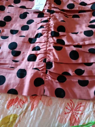 Minifalda Stradivarius lunares rosa