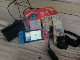 Pacchetto Nintendo Switch + 4 Giochi