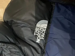 Chaqueta The North Face Azul y Negra
