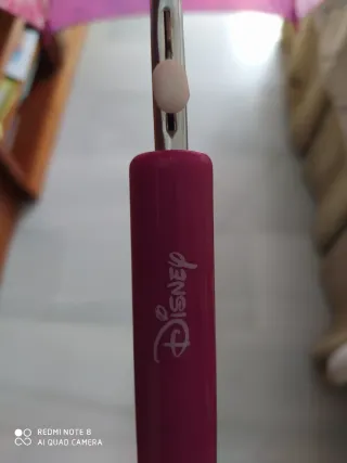 Paraguas infantil rosa y morado automático.