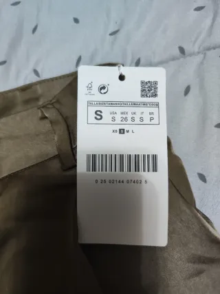 Pantalón dorado de pata ancha