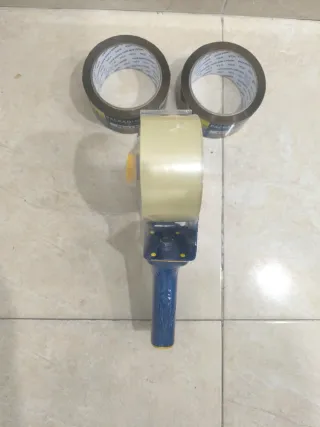 Pistola de embalaje y cinta adhesiva