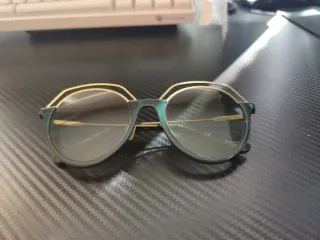 Gafas de sol Tory Burch doradas y verdes