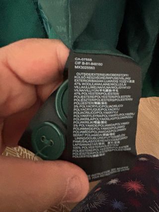 Abrigo a media pierna de la marca Mexx