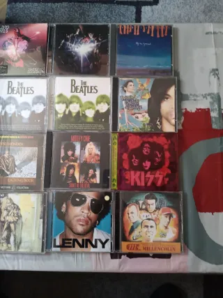 Lote 16 CDs: Rolling Stones, Beatles, Kiss