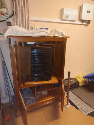 Mueble salón compartimento TV abatible