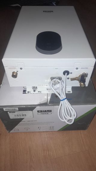 Calentador de agua a gas GILS con a penas uso