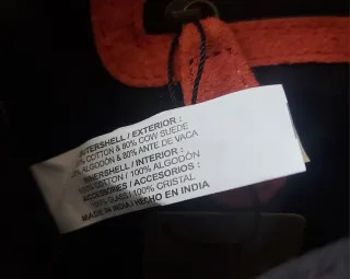 Cartera de mano bordada dorada