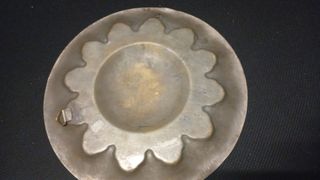 Piatto decorativo in metallo