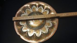 Piatto decorativo in metallo