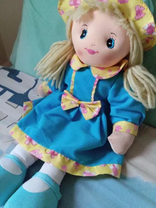 Peluche bambola vestita