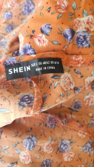 Vestido floral estilo milkmaid naranja