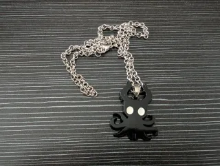 Collana con ciondolo di Hollow Knight