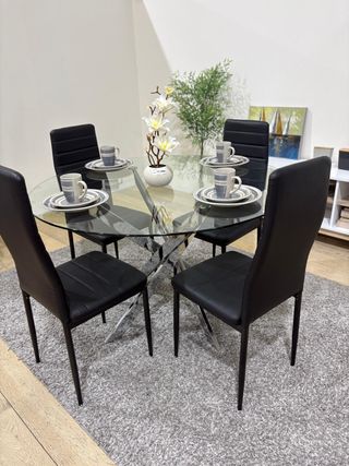Mesa de comedor redonda de cristal (aparte sillas)