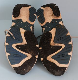 Zapatillas running grises y azules