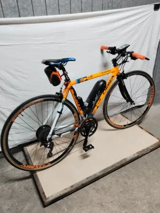 Bici eléctrica carretera Orbea naranja