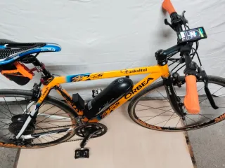 Bici eléctrica carretera Orbea naranja