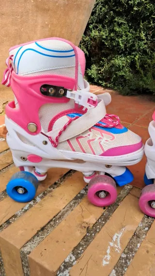 Patines rosas y blancos talla ajustable de niño 35