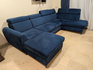 Sofá modular azul grande con cama