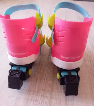 Patines infantiles rosas con ruedas.
